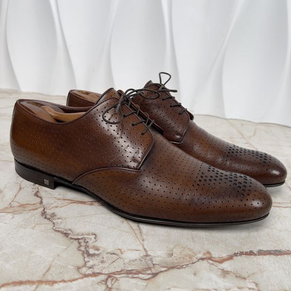 Класичне взуття дербі коричневі шкіряні із перфорацією 3670 фото