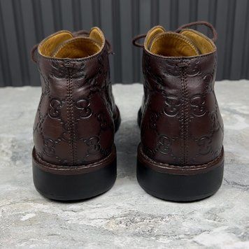 GG Monogram Embossed Ankle Boots Brown Leather