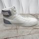 Rivoli Embossed Monogram Sneakers White Leather