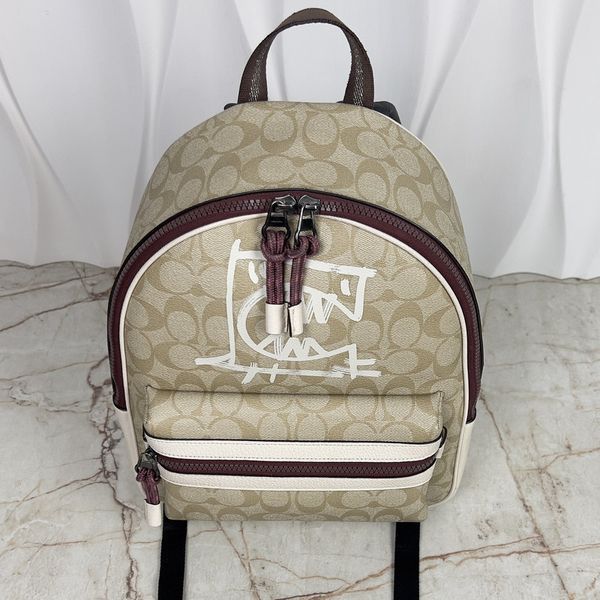 Charlie Medium Backpack In Signature Canvas With Rexy By Guang Yu
